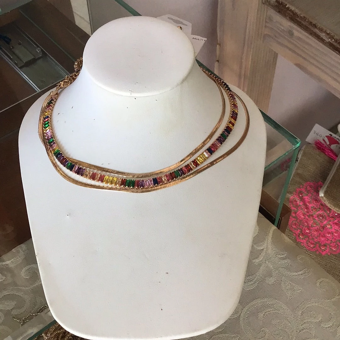 GOLDEN STELLA MULTI BAGUETTE & OMEGA NECKLACE 1 GOLDEN STELLA MULTI BAGUETTE & OMEGA NECKLACE